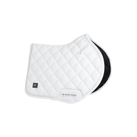 White quilted vision aura close contact saddle pad with black underside and woof wear branding