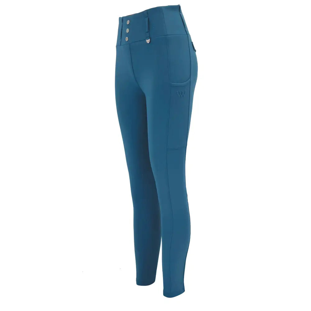 Teal woof wear vision riding tights with high waist, button closure, subtle branding, and micro-grip silicone detail