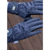 Black woof wear waterproof riding gloves showing the back with textured fabric and white logo on the wrist