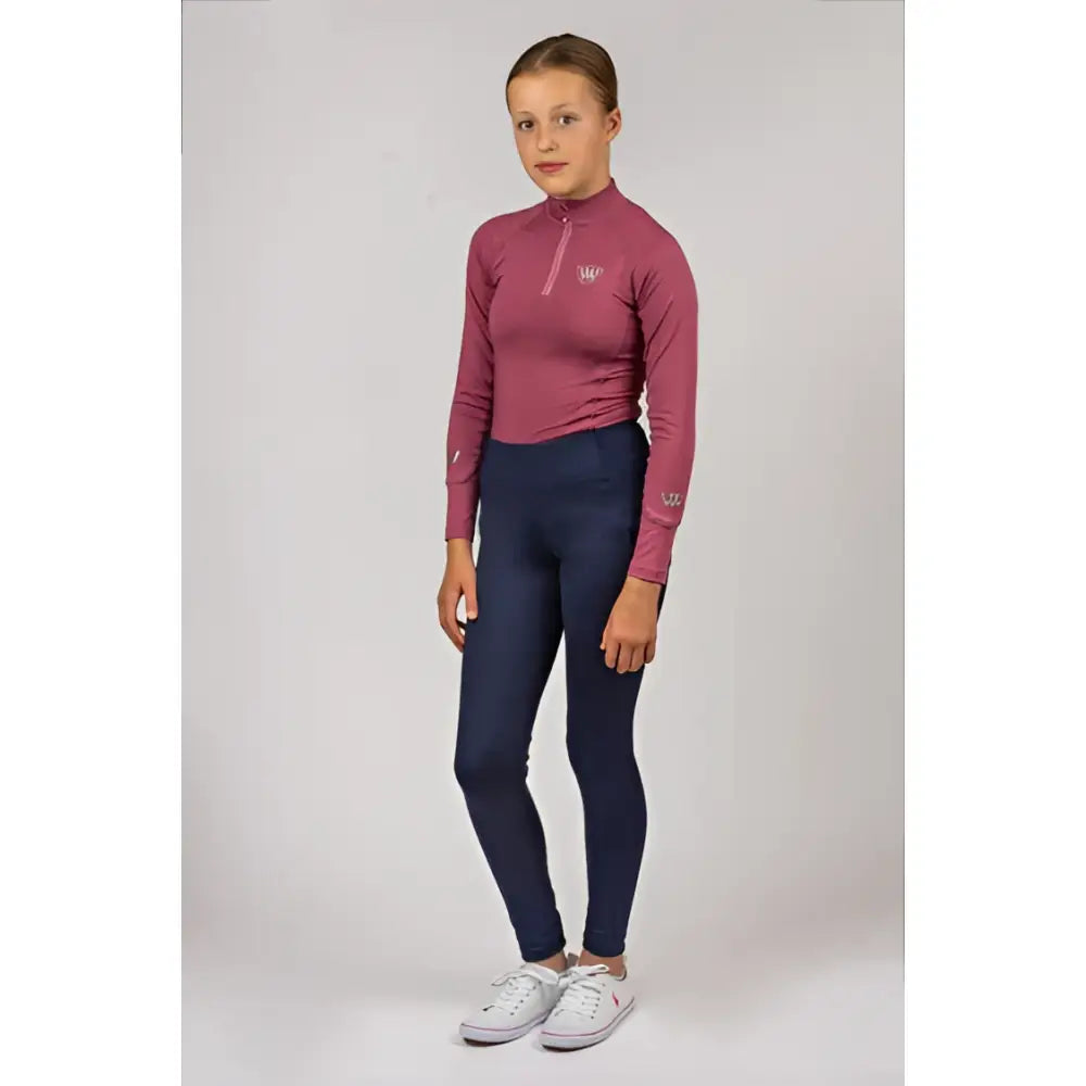 A maroon woof wear young rider tech shirt in iflex fabric with a quarter-zip collar and subtle chest logo