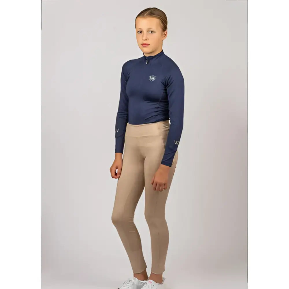Navy blue woof wear young rider tech shirt with small logo made from breathable iflex fabric for riding comfort