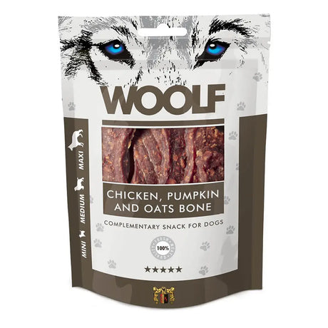 A package of woolf chicken pumpkin and oats bone dog treats featuring a bold wolf face design on the front