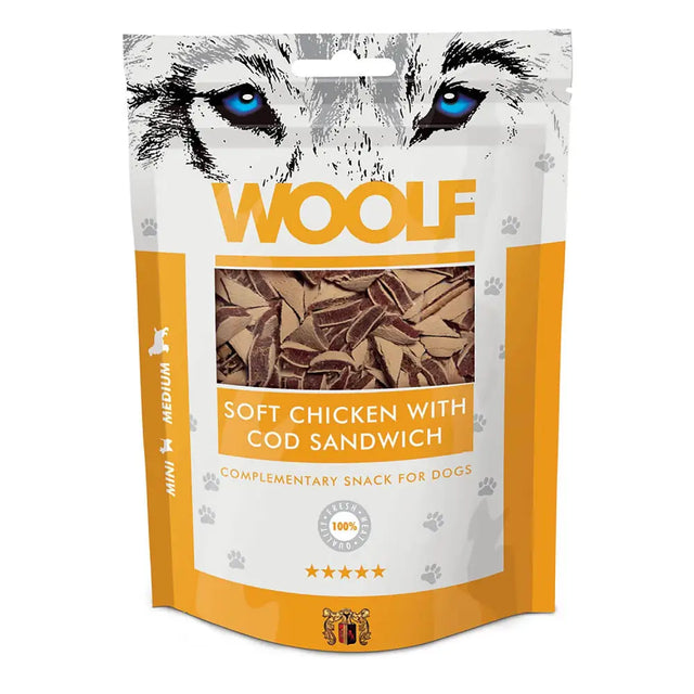 A white and orange bag of woolf soft chicken with cod sandwich dog treats featuring blue-eyed wolf illustration