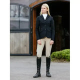 Black young rider kennedy show jacket with three front buttons and subtle side pockets for riding events