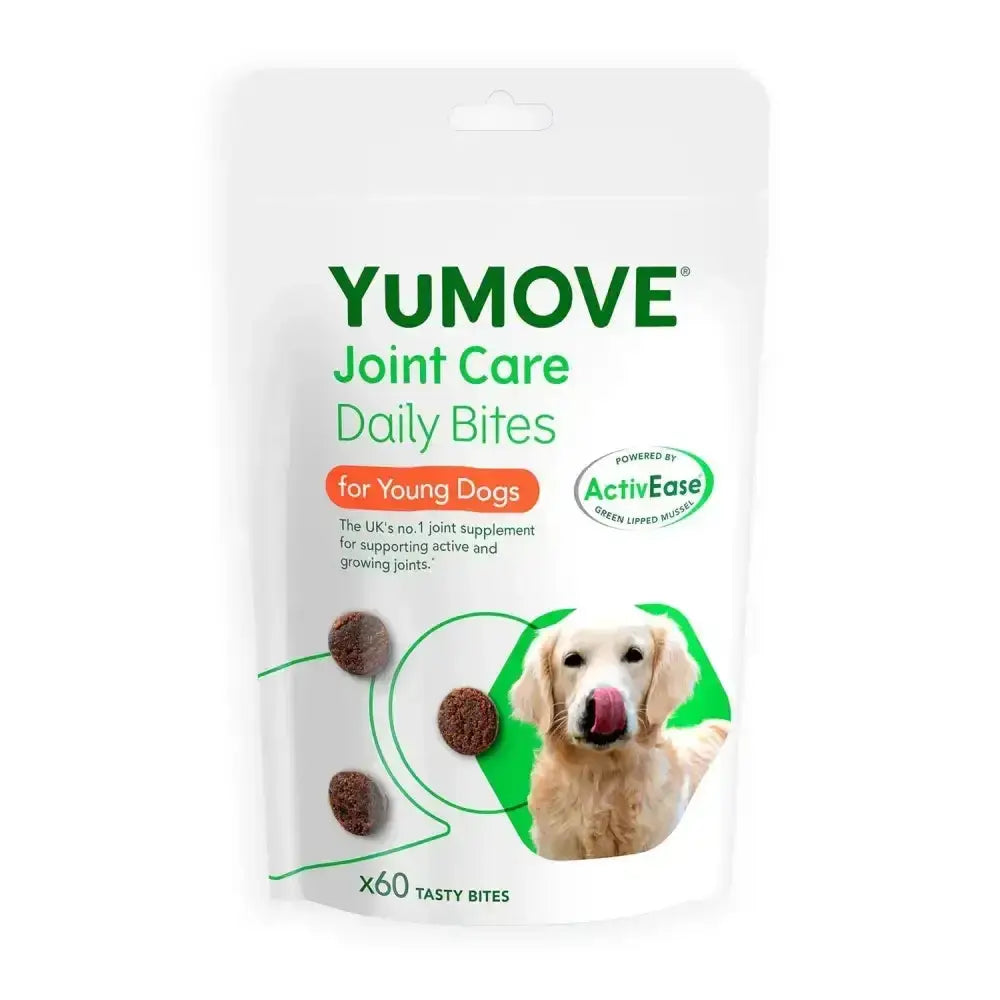 White pouch of yumove joint care daily bites for young dogs with green and orange text and a golden retriever licking its nose