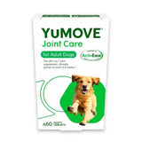 White and green cardboard box of yumove joint care for adult dogs with golden retriever to soothe stiffness and support long term joint health