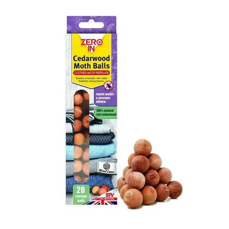 A package of zero in cedarwood clothes moth balls with 20 natural aromatic red cedar spheres in purple yellow sleeve