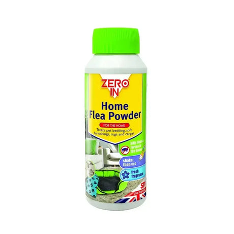 A white bottle with a green cap of zero in home flea powder designed to absorb pet odors in carpets and living spaces